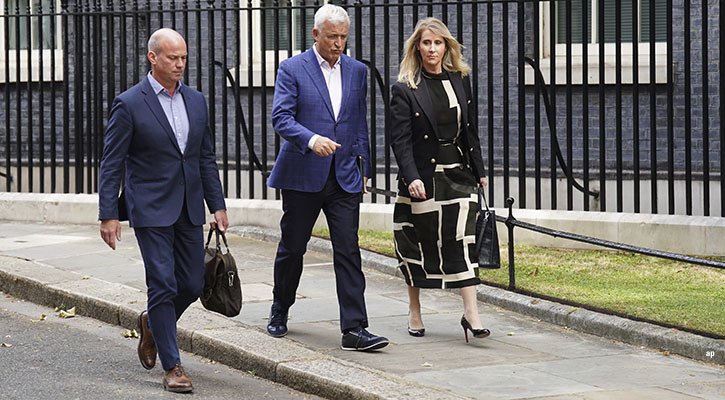 Banking executives walk in Downing Street